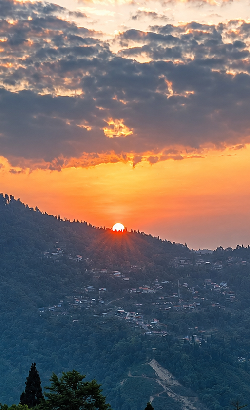 Golden sunrise from Sunrise Eco Homestay viewpoint